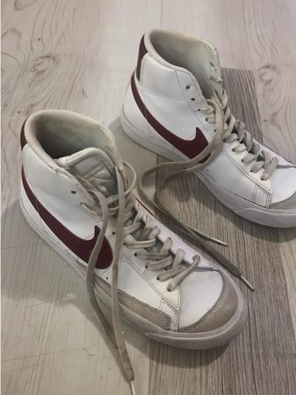 Nike Women's White Sneakers with Maroon Swoosh